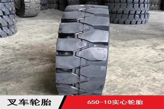 供應(yīng)工程機(jī)械3-3.5噸叉車前輪650-10實(shí)心輪胎，超強(qiáng)耐磨，三包服務(wù)帶鋼圈